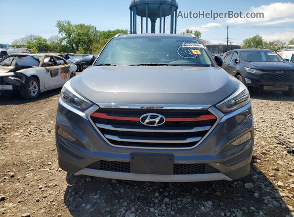 KM8J3CA24HU390226 2017 HYUNDAI TUCSON Gray 