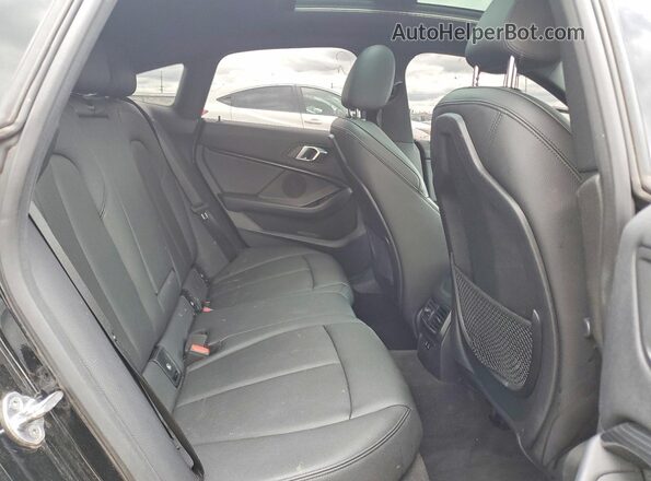 WBA73AK06M7H43249 2021 BMW OTHER Black Rear interior view