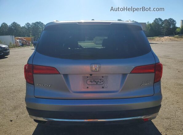 5FNYF6H00GB037750 2016 HONDA PILOT Серебряный Вид салона спереди