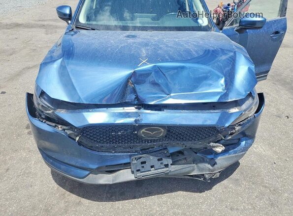 JM3KFBBM4M0334581 2021 MAZDA CX-5 Blue Vista de la etiqueta del VIN