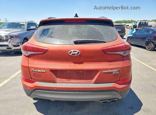 KM8J3CA27GU108708 2016 HYUNDAI TUCSON Orange Вид салону спереду