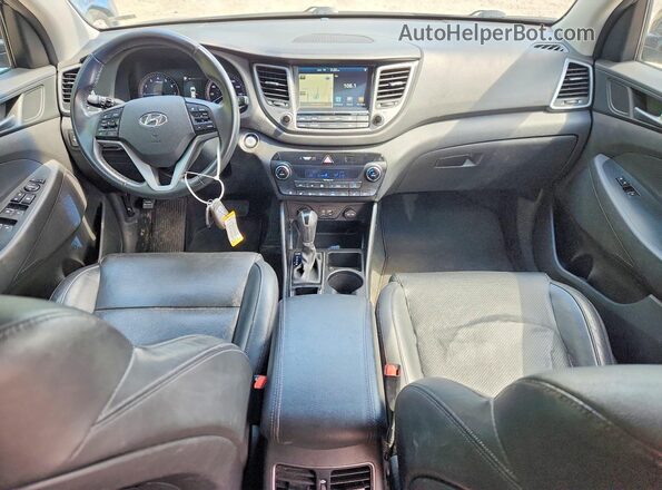 KM8J3CA26GU057802 2016 HYUNDAI TUCSON Gray 