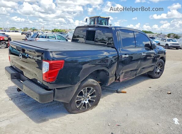 1N6AA1EFXMN526517 2021 NISSAN TITAN Black Przód prawy