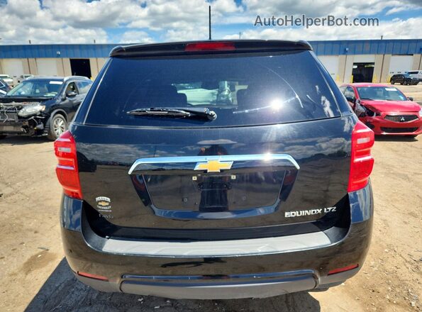2GNALBEK7H1571431 2017 CHEVROLET EQUINOX Black Front interior view