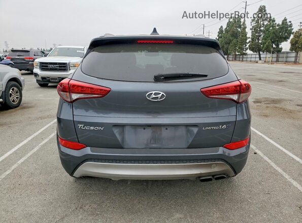 KM8J33A29HU413953 2017 HYUNDAI TUCSON Gray წინა სალონის ხედი
