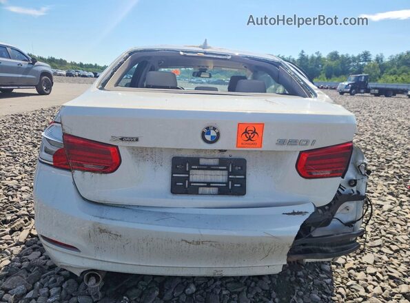 WBA8E5G53JNV02554 2018 BMW 3 SERIES White Front interior view