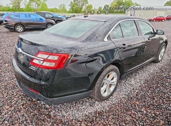 1FAHP2E8XHG116937 2017 FORD TAURUS Black 