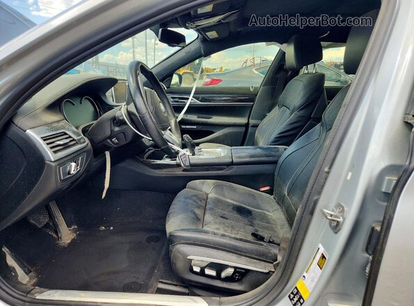 WBA7F2C55GG419198 2016 BMW 7 SERIES Silver Вид панелі приладів