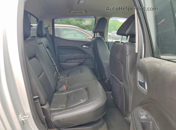 1GTP6DE16G1239577 2016 GMC CANYON Silver Սալոնի հետևի տեսք
