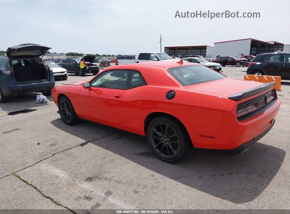 2C3CDZKGXMH560940 2021 DODGE CHALLENGER Orange Trasero izquierdo