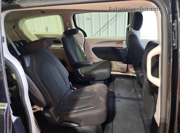 2C4RC1CG8PR610676 2023 CHRYSLER VOYAGER Black Vista interior trasera