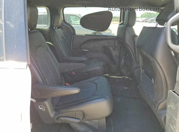 2C4RC1CG9SR525824 2025 CHRYSLER VOYAGER White Widok wnętrza z tyłu