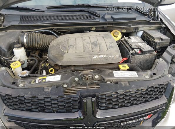 2C4RDGCG9JR243469 2018 DODGE GRAND CARAVAN Silver Vista trasera