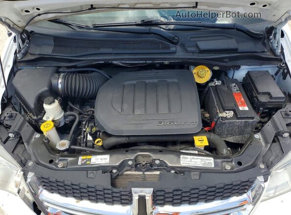 2C4RDGCG9LR154200 2020 DODGE GRAND White Vista del compartimento del motor
