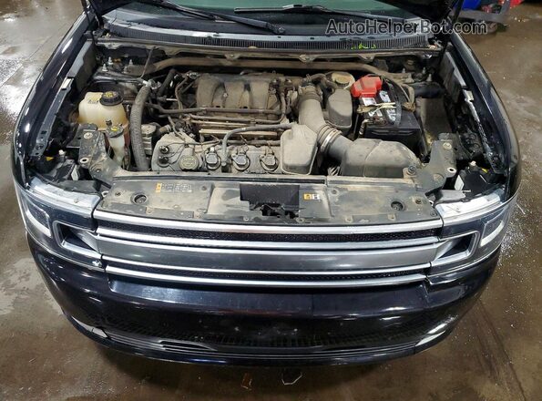 2FMHK6D80HBA03664 2017 FORD FLEX Black Widok wnętrza z tyłu