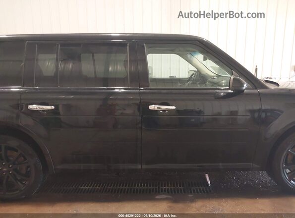 2FMHK6D82GBA11148 2016 FORD FLEX Black Widok wnętrza z tyłu