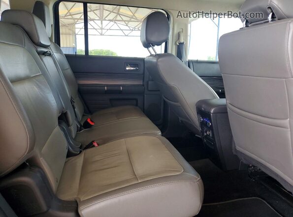 2FMHK6D8XHBA08435 2017 FORD FLEX Black Vista de los asientos traseros
