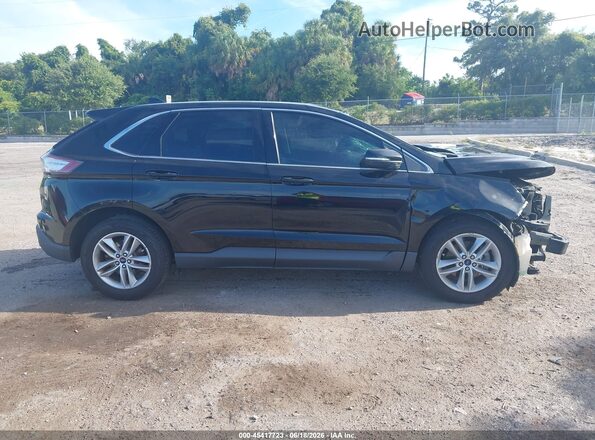 2FMPK3J88GBC34356 2016 FORD EDGE Black Rear interior view