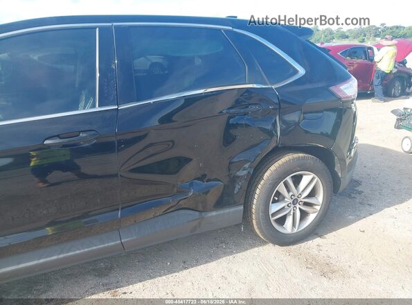 2FMPK3J88GBC34356 2016 FORD EDGE Black Front view