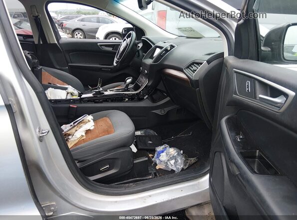 2FMPK3J88JBB10059 2018 FORD EDGE Silver Front interior view