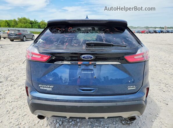 2FMPK3J90KBB79418 2019 FORD EDGE Blue Вид ззаду