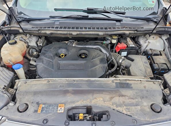 2FMPK3J91HBC10619 2017 FORD EDGE Tan Widok wnętrza z tyłu