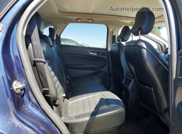 2FMPK3J92HBC49655 2017 FORD EDGE Blue Vista interior trasera