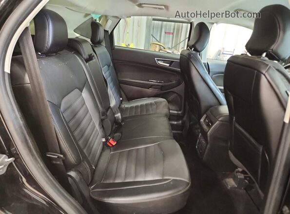2FMPK3J95HBB93470 2017 FORD EDGE Black Vista interior trasera