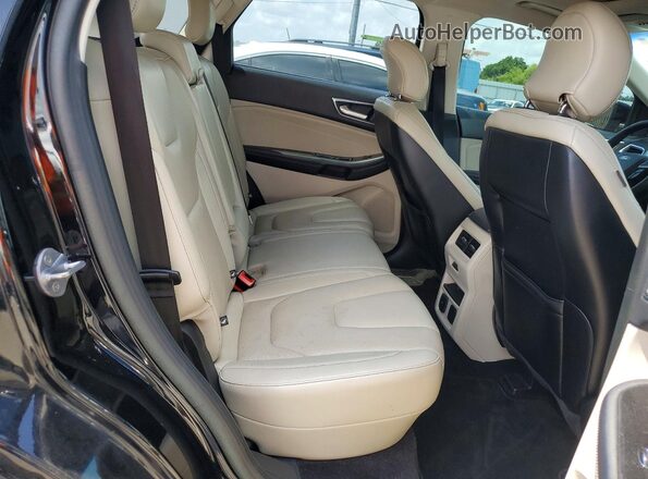 2FMPK3K81JBC13578 2018 FORD EDGE Black Սալոնի հետևի տեսք
