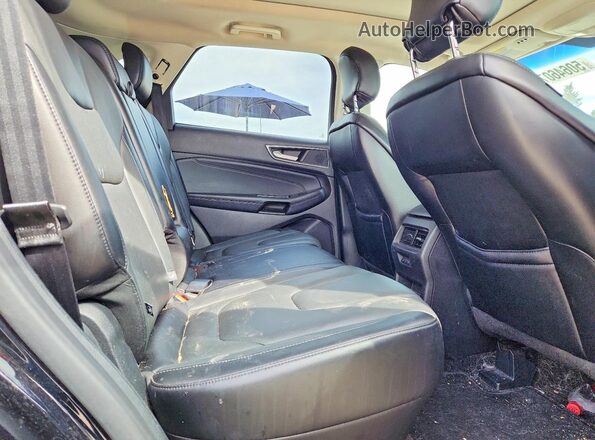 2FMPK3K82JBC33077 2018 FORD EDGE Black Սալոնի հետևի տեսք