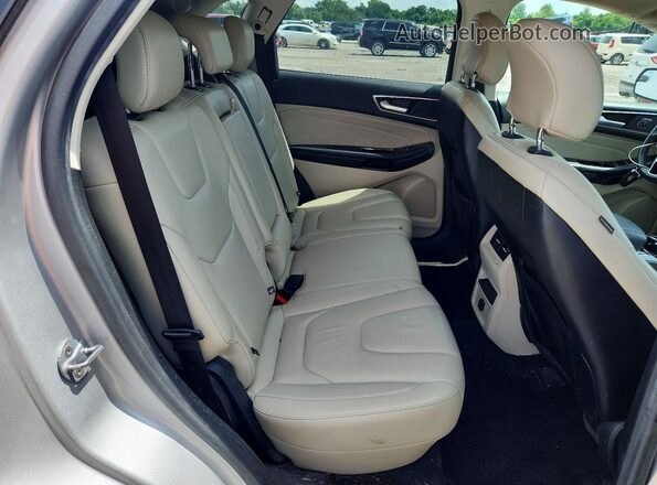 2FMPK3K90JBB42625 2018 FORD EDGE Silver Rear seats view