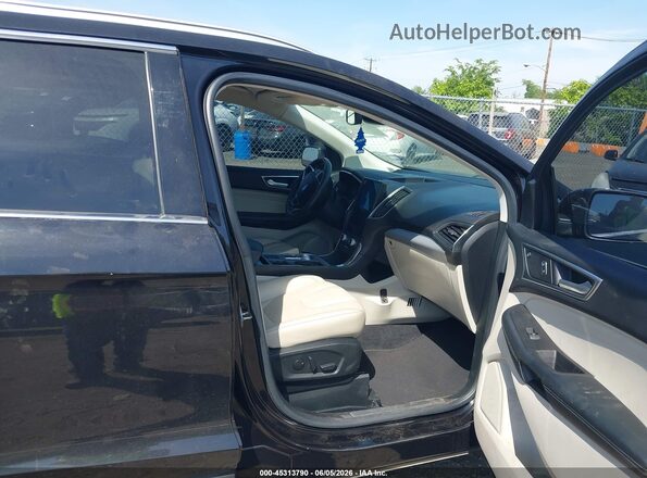 2FMPK3K90MBA18424 2021 FORD EDGE Черный Вид салона спереди