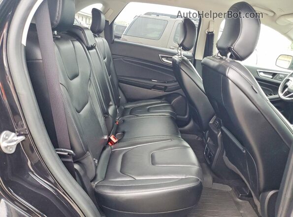 2FMPK3K93KBB35511 2019 FORD EDGE Черный Вид задней части салона