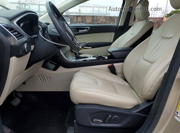 2FMPK3K95JBB79704 2018 FORD EDGE Gold Вид салону спереду