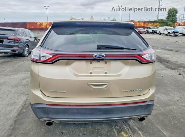 2FMPK3K95JBB79704 2018 FORD EDGE Gold Вид ззаду