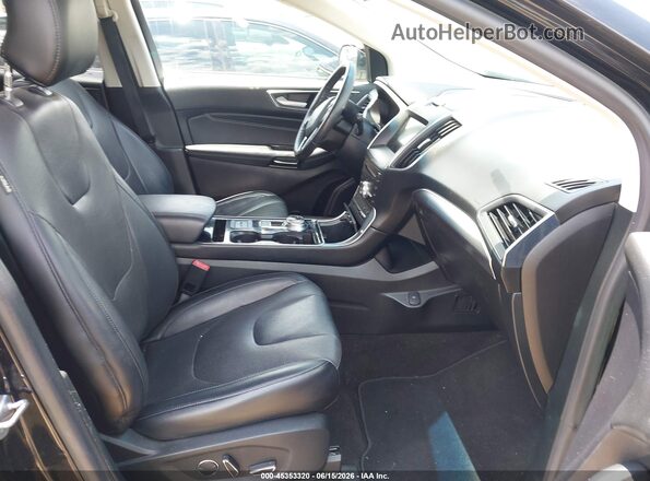 2FMPK3K95KBB52973 2019 FORD EDGE Черный Вид салона спереди