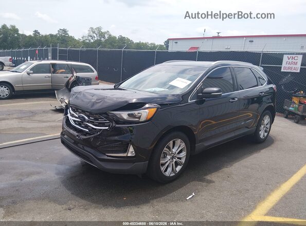 2FMPK3K97KBB54076 2019 FORD EDGE Black Vista tres cuartos delantera izquierda