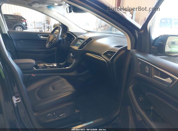 2FMPK3K97KBB75316 2019 FORD EDGE Черный Вид салона спереди