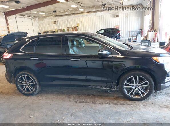 2FMPK3K97KBB75316 2019 FORD EDGE Черный Вид задней части салона