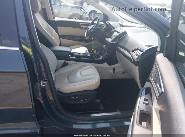 2FMPK3K9XKBC68363 2019 FORD EDGE Blue Vista interior delantera