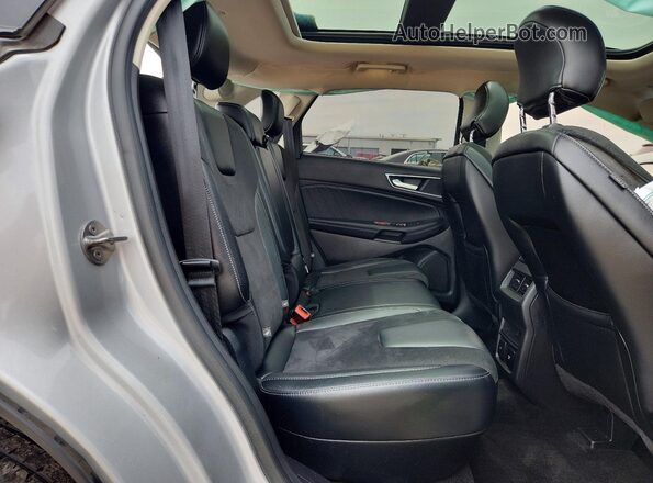 2FMPK4AP0HBC25438 2017 FORD EDGE Silver Rear interior view