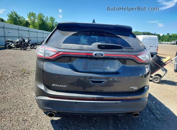 2FMPK4J80JBB66552 2018 FORD EDGE Gray Rear view