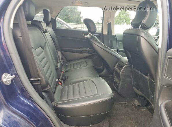 2FMPK4J84GBC05426 2016 FORD EDGE Blue Vista interior trasera
