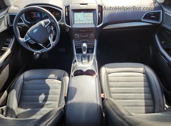 2FMPK4J85HBB99735 2017 FORD EDGE Черный Вид панели приборов