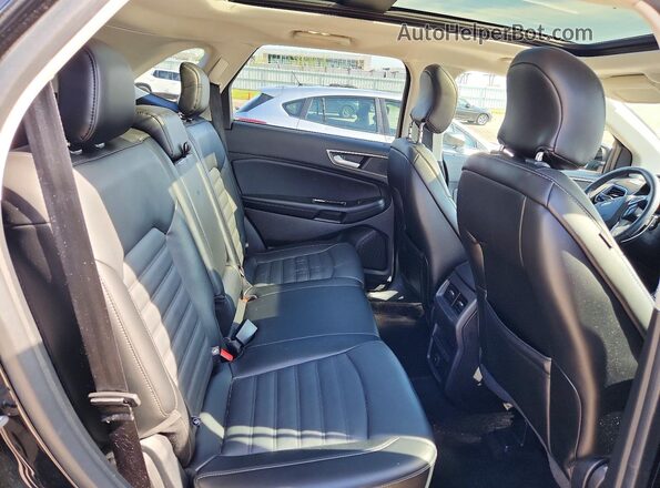 2FMPK4J85HBB99735 2017 FORD EDGE Черный Вид задней части салона