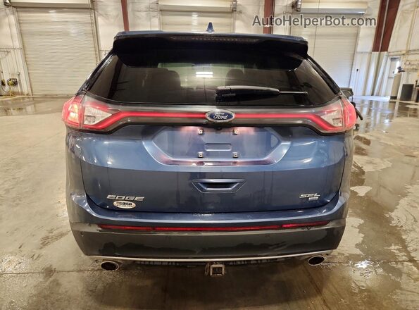 2FMPK4J87JBB05232 2018 FORD EDGE Blue Rear view