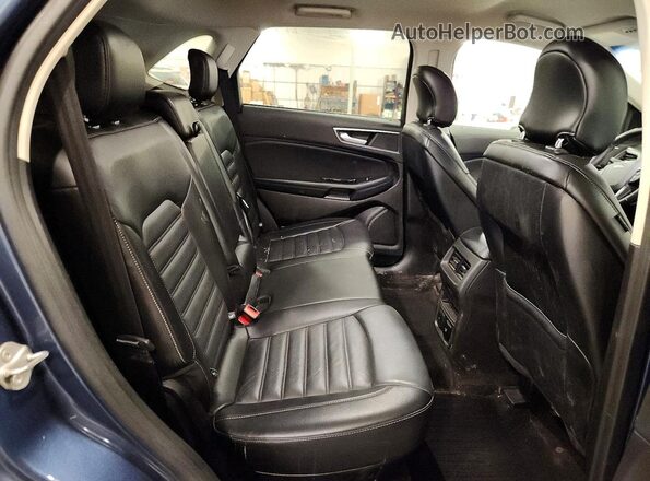 2FMPK4J87JBB05232 2018 FORD EDGE Blue Rear interior view