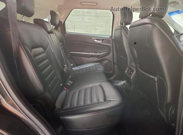 2FMPK4J8XHBB19054 2017 FORD EDGE Gray Rear interior view