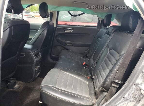 2FMPK4J8XHBC12074 2017 FORD EDGE Charcoal Vista interior trasera