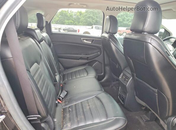 2FMPK4J90LBB21722 2020 FORD EDGE Черный Вид задней части салона